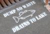 Stencils on stormwater drains give a gentle reminder. Photo courtesy of Cook County Soil & Water 